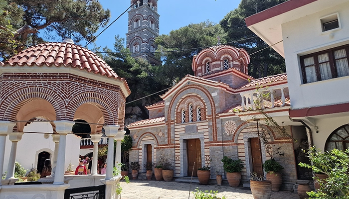 Agios Georgios church in Selinari Crete surrounded by trees, a peaceful and safe place for visitors