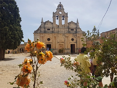 Crete Arkadi Monastery church facade with roses
