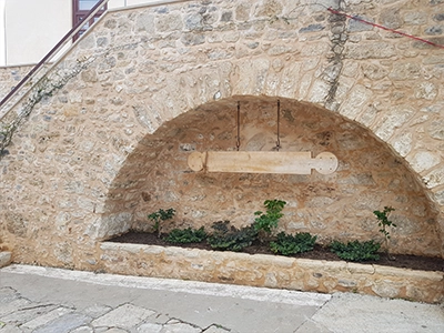 Crete Arkadi Monastery courtyard sign