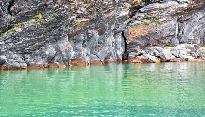 Swimming in Santorini volcano hot springs during a day trip from Crete