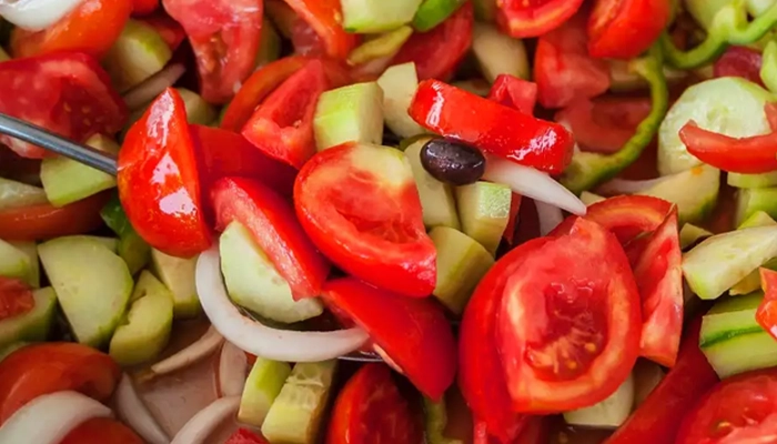 Greek salad with feta during Spinalonga BBQ boat tour in Crete with Car and Travel