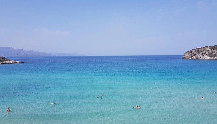 Voulisma Beach in Crete with crystal clear turquoise water, a safe and popular destination for tourists